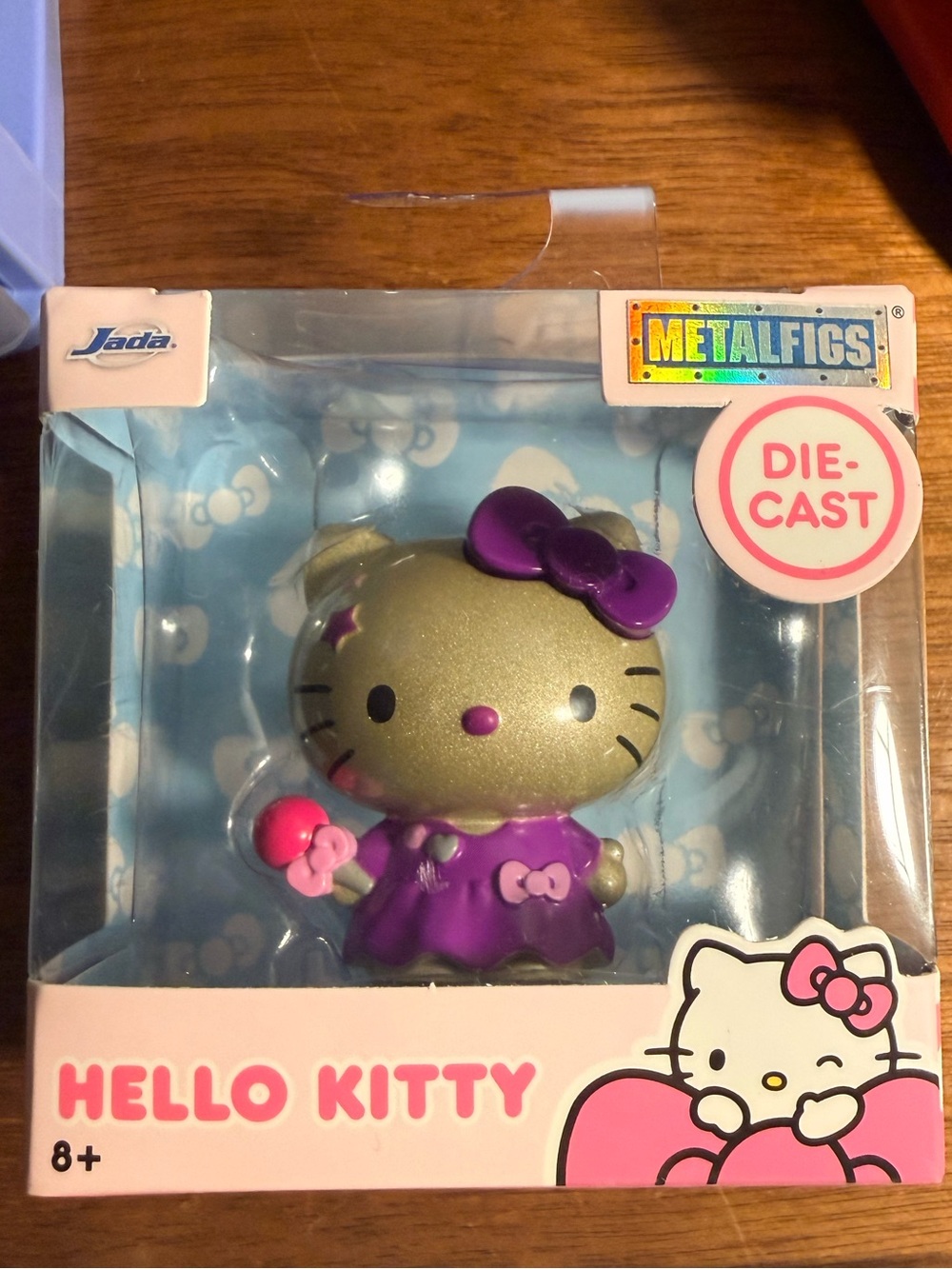Hello Kitty Metalfigs Die-Cast Figurine - Gold & Purple